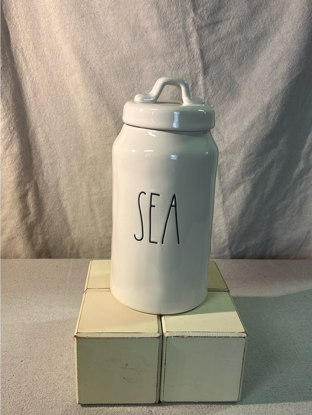 Rae Dunn White Ceramic Canister with Black 'SEA' Lettering